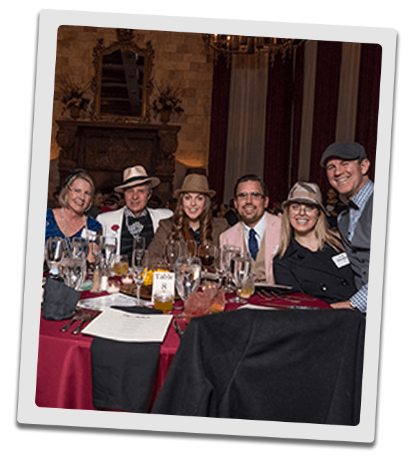 Seattle Murder Mystery party guests at the table