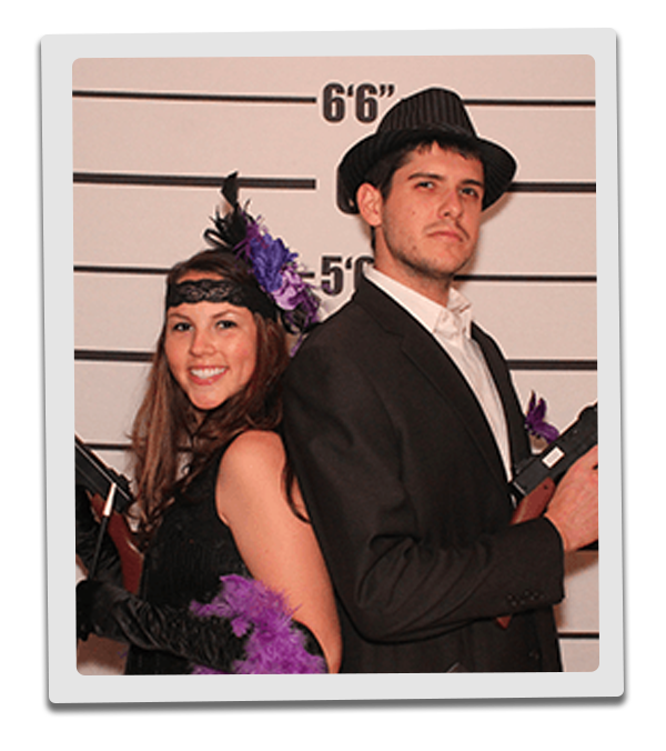 Seattle Murder Mystery party guests pose for mugshots